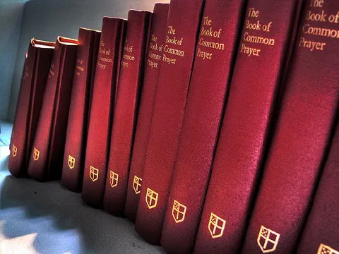 A Book of Common Prayer open for worship