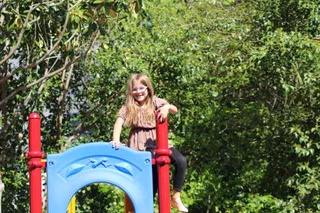 A child playing on the church playground